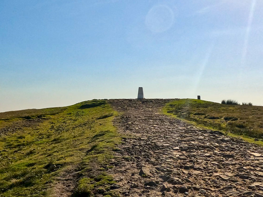 Approaching the trig point on the top of Pendle Hill