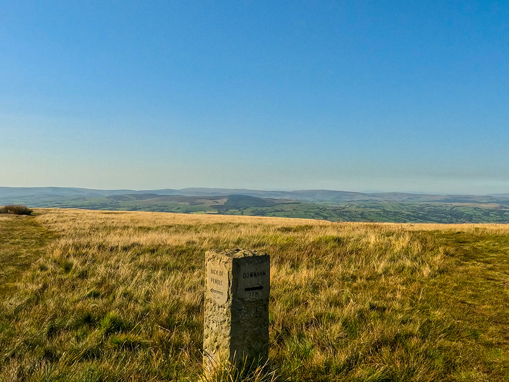 The stone marker, left is the path we walked up, we follow right to Downham for the return leg