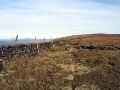 Looking back along the wall