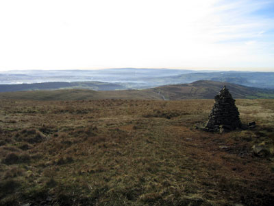 The cairn by the corner of the wall